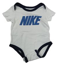 Bílé body s nápisem Nike