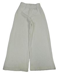 Smetanové mačkané široké kalhoty H&M