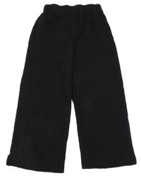 Černé vzorované kalhoty H&M