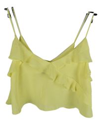 Dámský žlutý crop top s volánkem Primark 